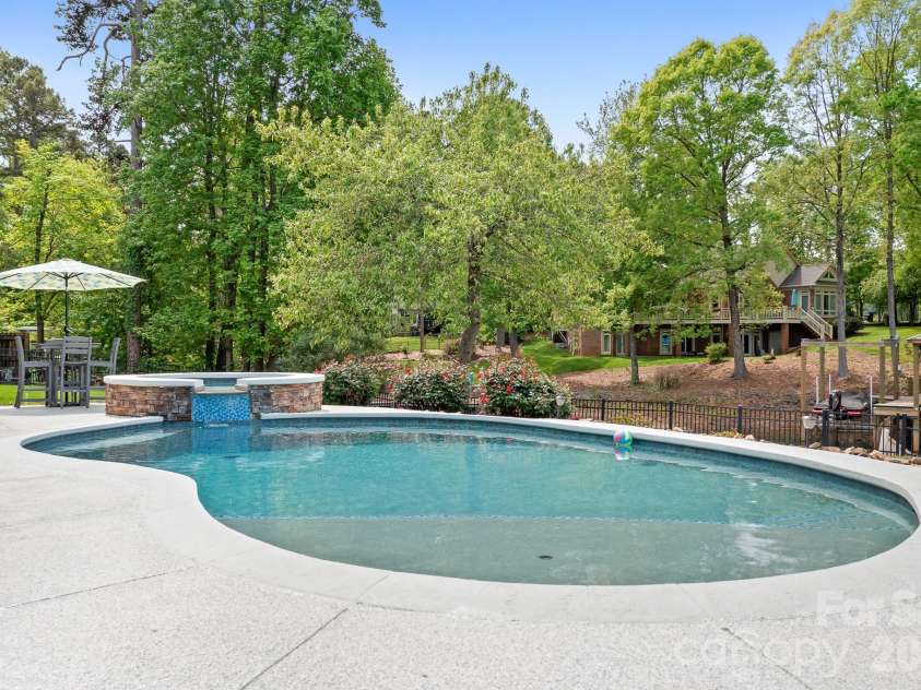 1395 Strawberry Lane, Denver, NC 28037.  MLS# CAR4370070, YatesRealty ID 19880. Pool and spa for summertime fun!