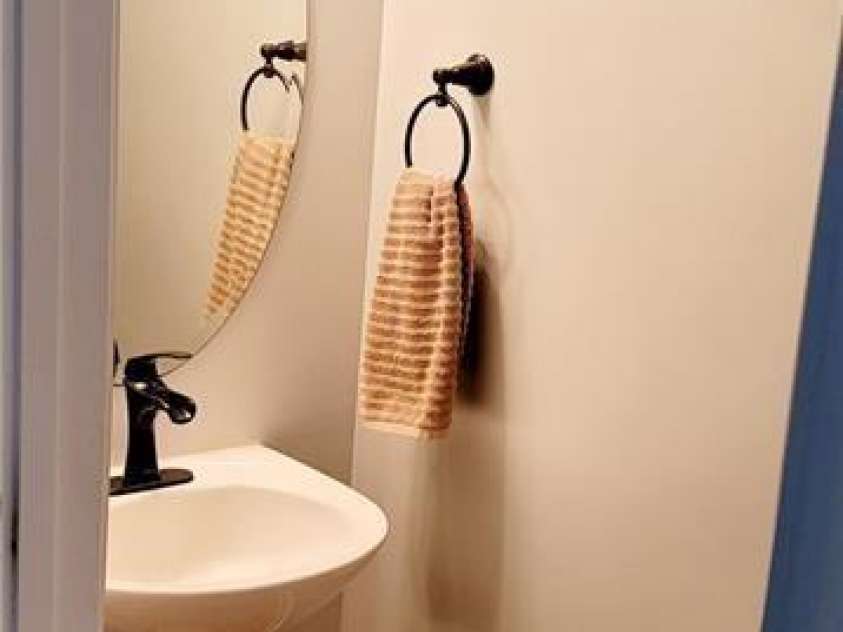 15404 Crossing Gate Drive, Cornelius, NC 28031.  MLS# CAR4363409, YatesRealty ID 19885. First floor powder room