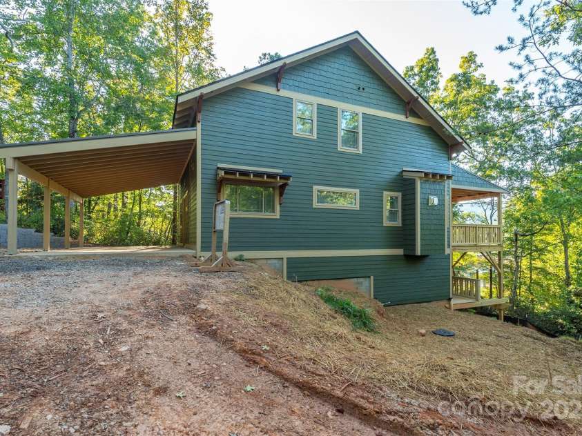 105 Bartram Way, Black Mountain, NC 28711.  MLS# CAR4330649, YatesRealty ID 1989. Driveway to be paved.  Beautifully constructed cottage.
