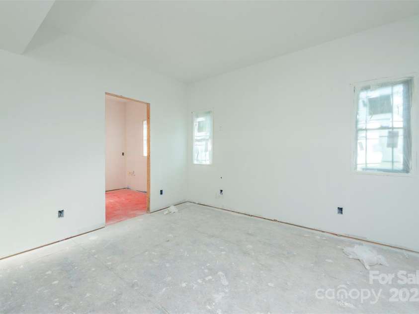 105 Bartram Way, Black Mountain, NC 28711.  MLS# CAR4330649, YatesRealty ID 1989. Primary Suite.  Looking towards Primary Bathroom with Heated Tile Floors.