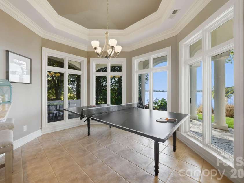 18103 Harbor Light Boulevard, Cornelius, NC 28031.  MLS# CAR4361515, YatesRealty ID 19890. Casual breakfast area off the secondary kitchen, ideal for everyday living with seamless indoor-outdoor flow
