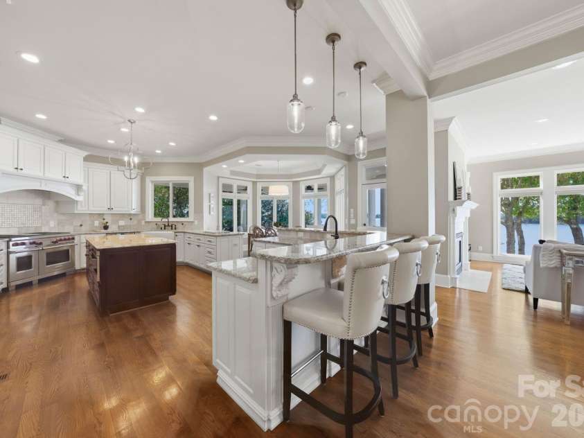18103 Harbor Light Boulevard, Cornelius, NC 28031.  MLS# CAR4361515, YatesRealty ID 19890. Chef’s kitchen with oversized island and casual seating