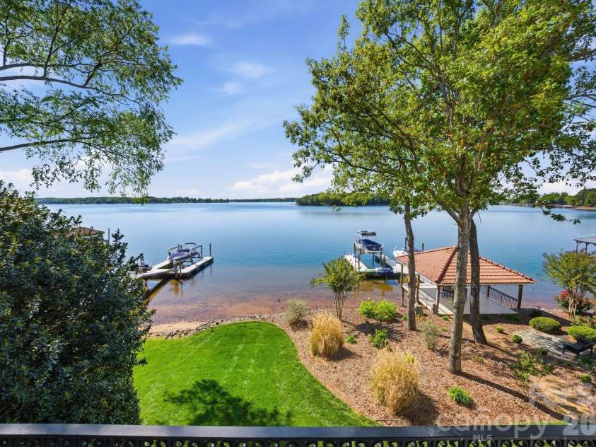 18103 Harbor Light Boulevard, Cornelius, NC 28031.  MLS# CAR4361515, YatesRealty ID 19890. Panoramic main channel views from the terrace overlooking Lake Norman