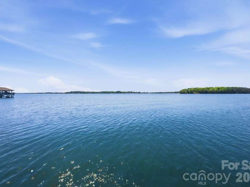 18103 Harbor Light Boulevard, Cornelius, NC 28031.  MLS# CAR4361515, YatesRealty ID 19890. Wide-open main channel views offering endless horizon and serenity.