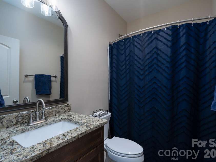 478 Iron Horse Lane, Midland, NC 28107.  MLS# CAR4371035, YatesRealty ID 19891. Bathroom - lower level