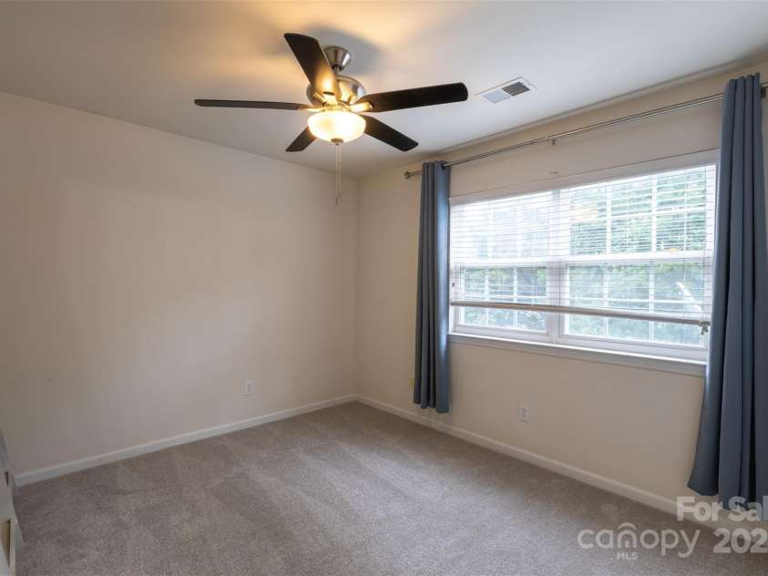 4637 Willow Glen Road, Harrisburg, NC 28075.  MLS# CAR4264007, YatesRealty ID 19892. Guest Bedroom 3Upper Level