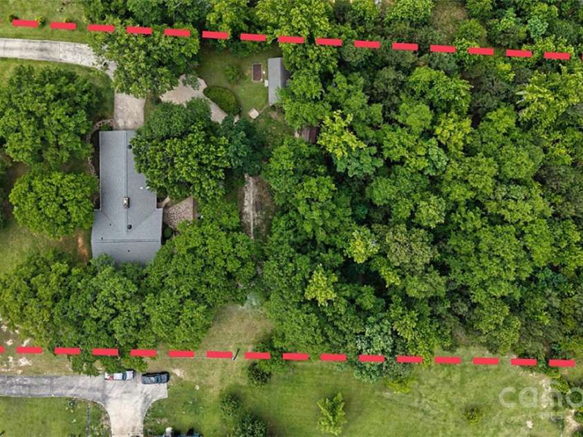 2618 Pineview Drive, Lancaster, SC 29720.  MLS# CAR4263845, YatesRealty ID 19900. Large lot that includes extensive wooded area.