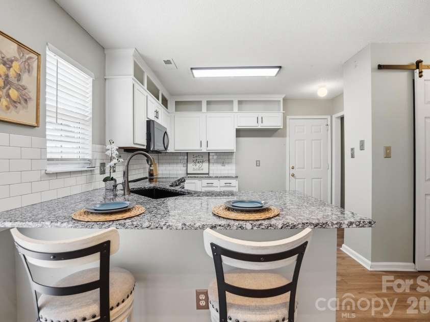 3947 Longwood Drive, Concord, NC 28027.  MLS# CAR4365279, YatesRealty ID 19901. 