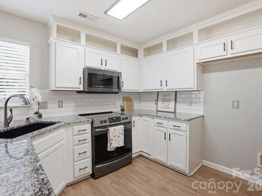 3947 Longwood Drive, Concord, NC 28027.  MLS# CAR4365279, YatesRealty ID 19901. 