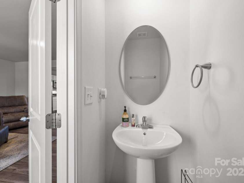 718 Dillon Way, Fort Mill, SC 29715.  MLS# CAR4264495, YatesRealty ID 19901. Powder room in main living area