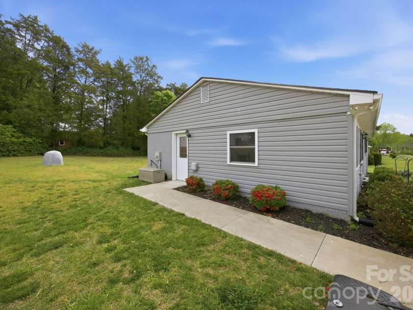 104 Sunset Drive, Rockwell, NC 28138.  MLS# CAR4373662, YatesRealty ID 19903. Side entrance