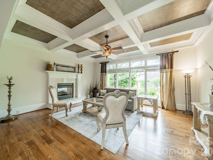 602 Beauhaven Lane, Waxhaw, NC 28173.  MLS# CAR4373162, YatesRealty ID 19904. Coffered ceiling and see through gas fireplace