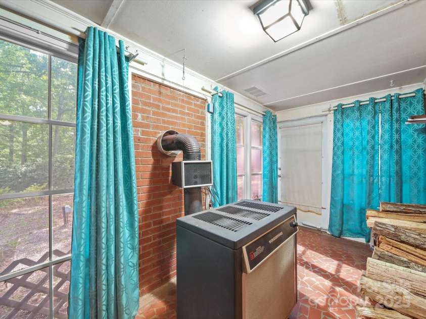 2831 Puetts Chapel Road, Bessemer City, NC 28016.  MLS# CAR4268907, YatesRealty ID 19907. Back screened-in porch