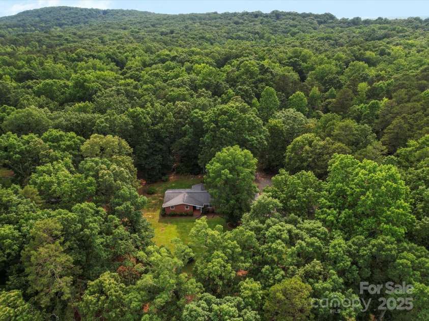 2831 Puetts Chapel Road, Bessemer City, NC 28016.  MLS# CAR4268907, YatesRealty ID 19907. Beautiful wooded acreage!