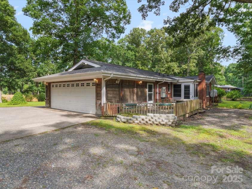 2831 Puetts Chapel Road, Bessemer City, NC 28016.  MLS# CAR4268907, YatesRealty ID 19907. Two car, side load garage