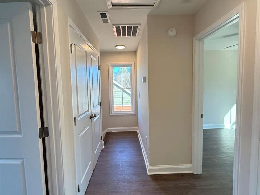 449 Cabarrus Avenue, Concord, NC 28027.  MLS# CAR4346597, YatesRealty ID 1991. Upstairs Hallway view 1