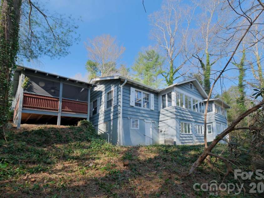 71 Norfolk Lane, Laurel Park, NC 28739.  MLS# CAR4345352, YatesRealty ID 19912. Back view of the house