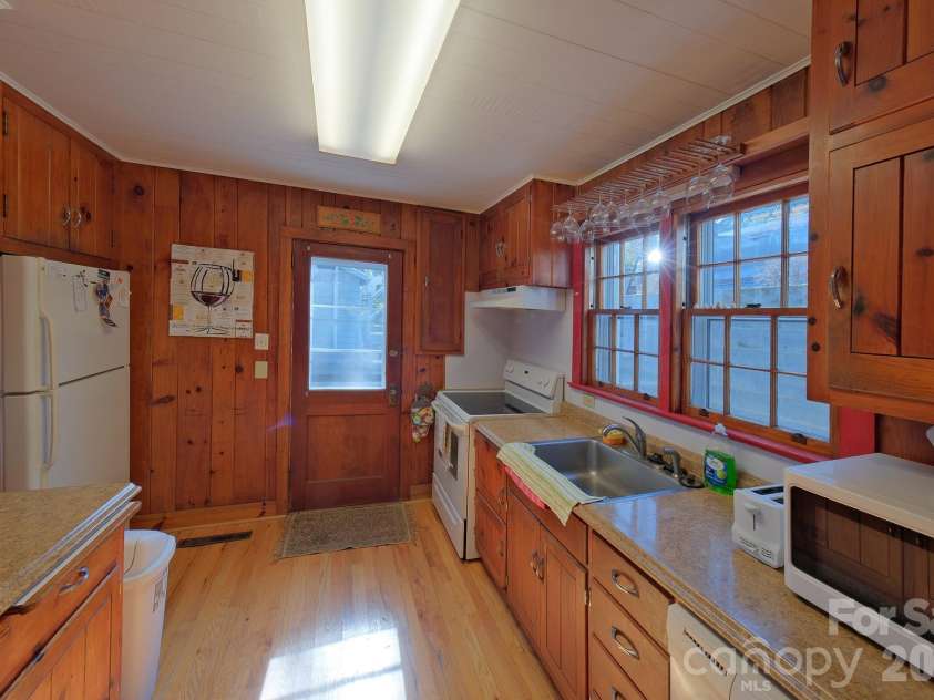 71 Norfolk Lane, Laurel Park, NC 28739.  MLS# CAR4345352, YatesRealty ID 19912. Back view of the house