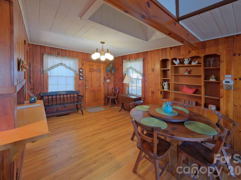 71 Norfolk Lane, Laurel Park, NC 28739.  MLS# CAR4345352, YatesRealty ID 19912. Front Door entrance to sitting area - to Dining area