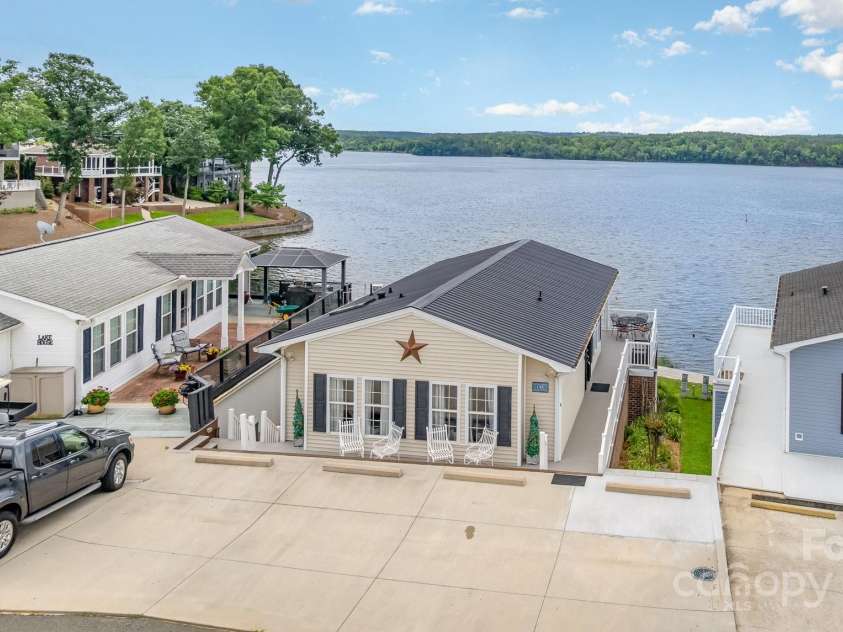 141 Badin Lake Circle, New London, NC 28127.  MLS# CAR4266787, YatesRealty ID 19917. 