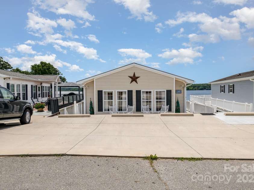 141 Badin Lake Circle, New London, NC 28127.  MLS# CAR4266787, YatesRealty ID 19917. 