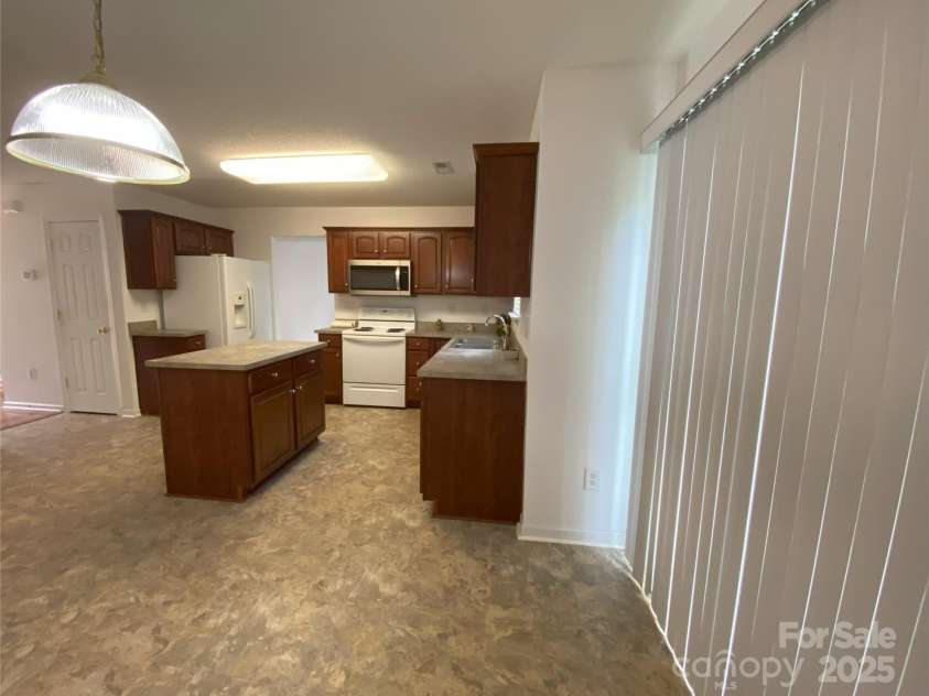 3933 Cameron Creek Drive, Matthews, NC 28105.  MLS# CAR4271452, YatesRealty ID 19921. 
