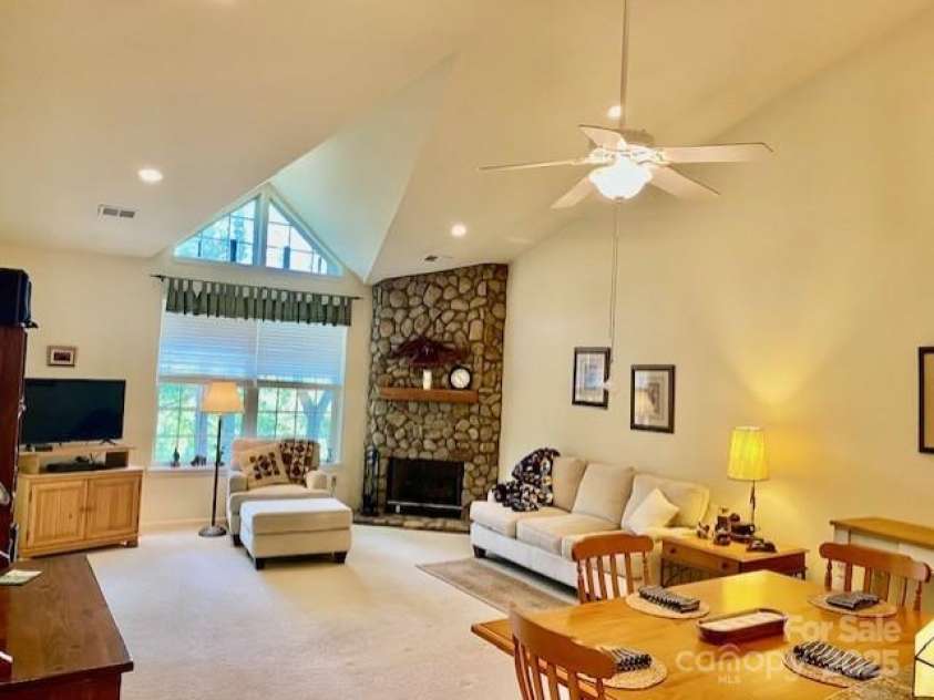 186 Stonecrest Court, Lake Lure, NC 28746.  MLS# CAR4270856, YatesRealty ID 19926. Beautiful stone gas  fireplace 