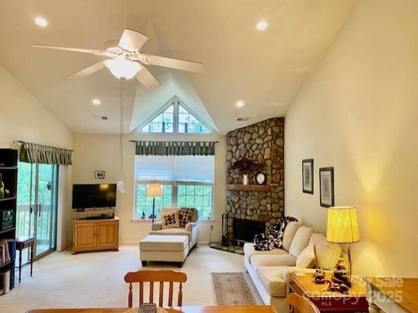 186 Stonecrest Court, Lake Lure, NC 28746.  MLS# CAR4270856, YatesRealty ID 19926. Open concept kitchen, dining and living room