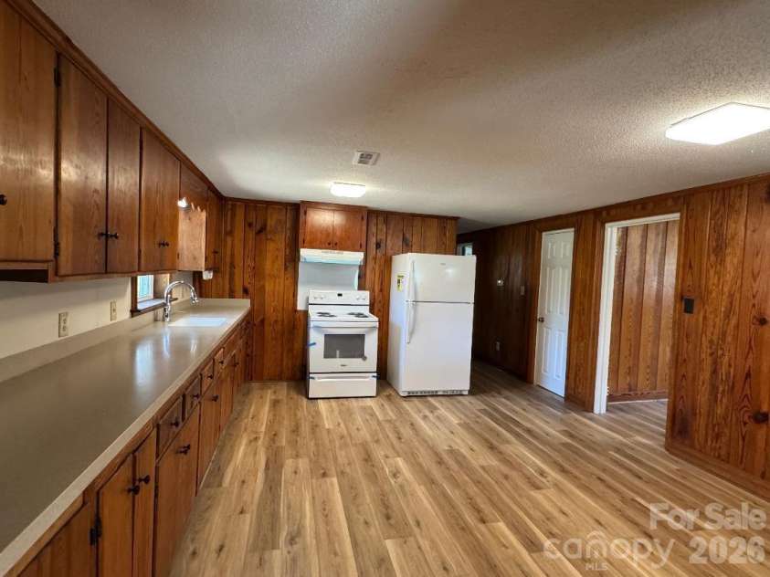 303 Green Street, Biscoe, NC 27209.  MLS# CAR4357820, YatesRealty ID 19927. Kitchen Picture A