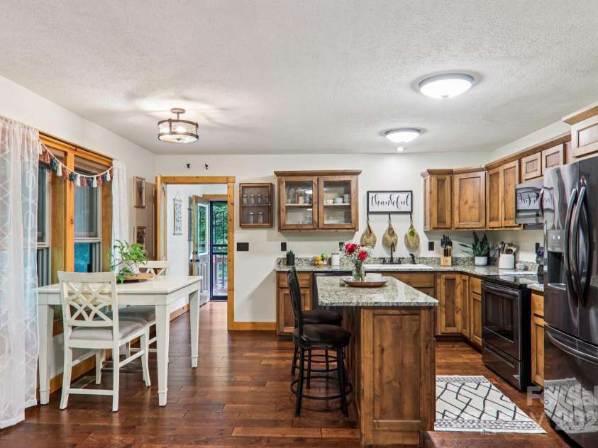 2171 Black Rock Road, Cherokee, NC 28719.  MLS# CAR4270256, YatesRealty ID 19928. Kitchen from living room