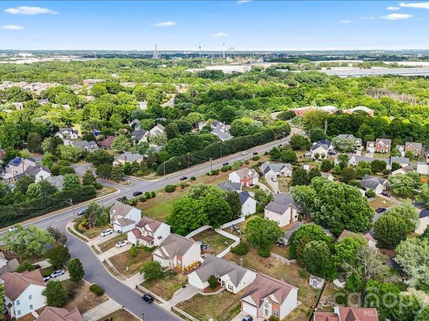 14413 John Beck Drive, Charlotte, NC 28273.  MLS# CAR4374623, YatesRealty ID 19941. Convenient to the airport, interstates and more... you can see the Carowinds roller coasters in the distance. 