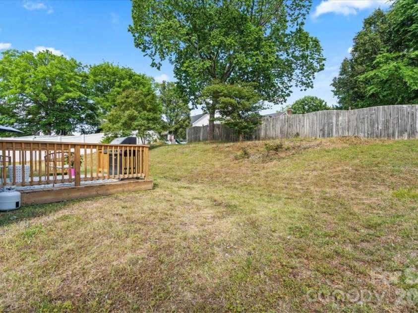 14413 John Beck Drive, Charlotte, NC 28273.  MLS# CAR4374623, YatesRealty ID 19941. Sunlight abounds for gardening, games or other backyard fun. 