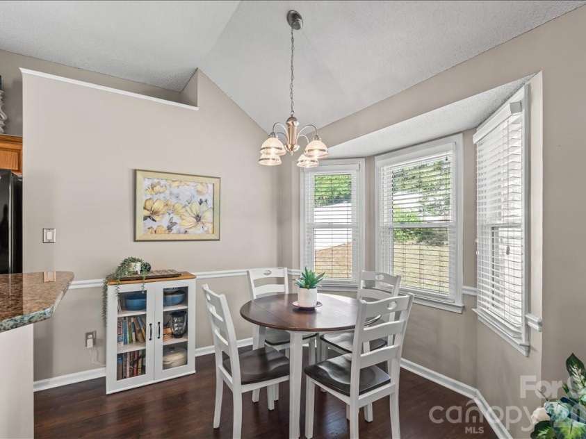 14413 John Beck Drive, Charlotte, NC 28273.  MLS# CAR4374623, YatesRealty ID 19941. Sunny breakfast area at the bay window off the kitchen, ready for morning coffee or casual weeknight meals