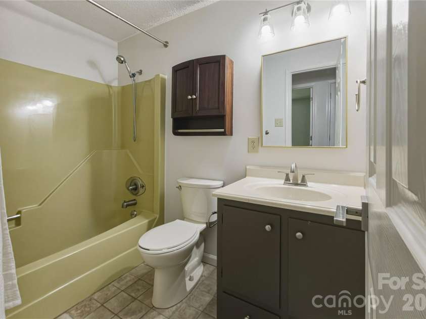 1983 Pinecrest Drive, Morganton, NC 28655.  MLS# CAR4376718, YatesRealty ID 19944. Hallway Bathroom