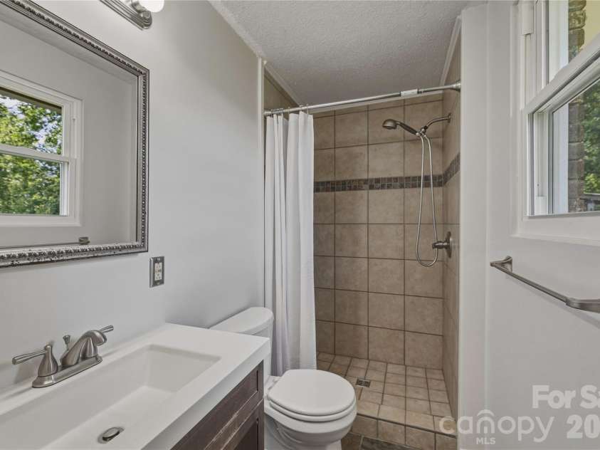 1983 Pinecrest Drive, Morganton, NC 28655.  MLS# CAR4376718, YatesRealty ID 19944. Primary Bathroom