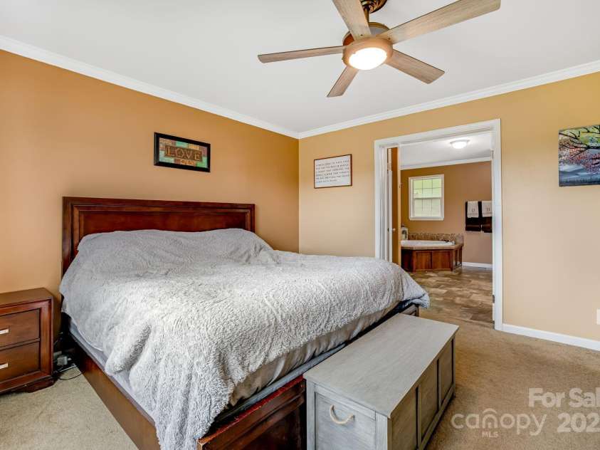 14 Phoenix Circle, Alexander, NC 28701.  MLS# CAR4255893, YatesRealty ID 19945. Master bedroom