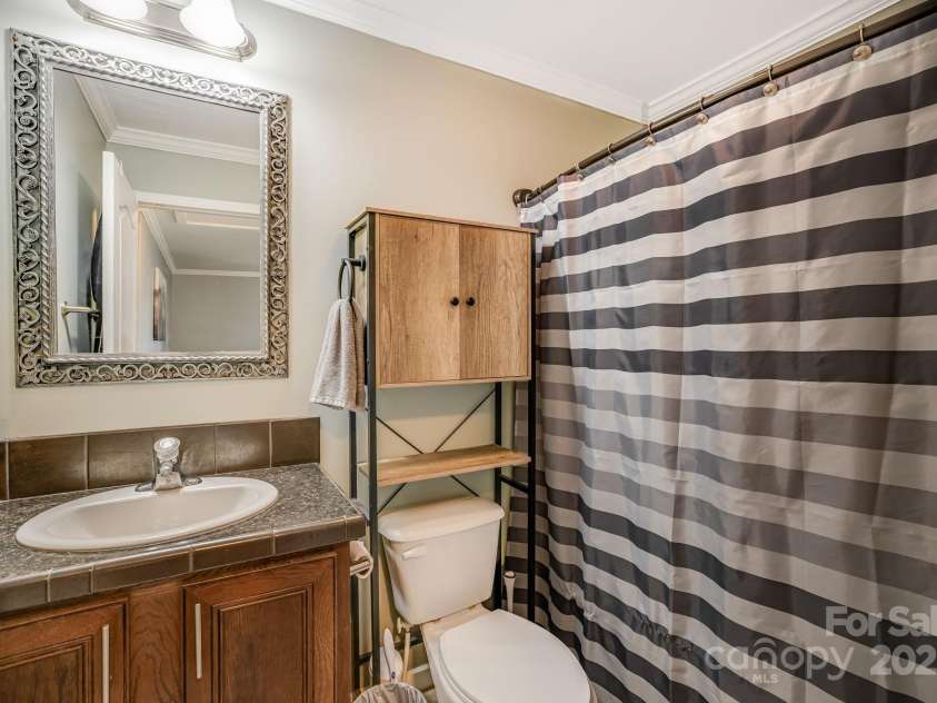 14 Phoenix Circle, Alexander, NC 28701.  MLS# CAR4255893, YatesRealty ID 19945. Second bathroom