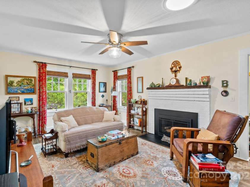 160 Hidden Hill Road, Tryon, NC 28782.  MLS# CAR4259798, YatesRealty ID 19956. Spacious living room is just under 12' x 18'