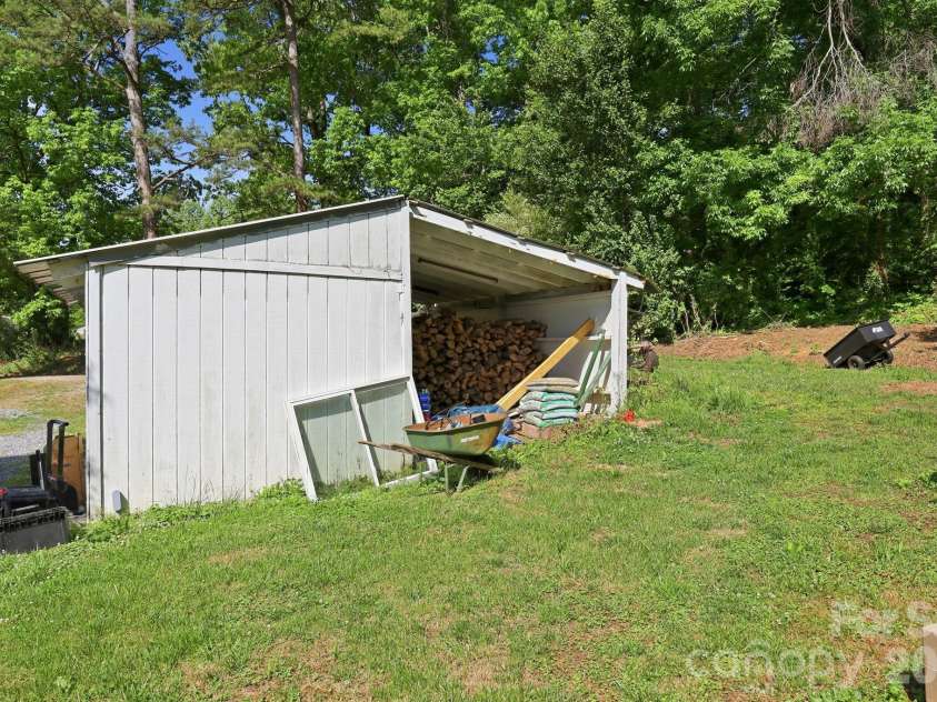5054 Sugar Hill Road, Marion, NC 28752.  MLS# CAR4359799, YatesRealty ID 19956. Back Yard Shed