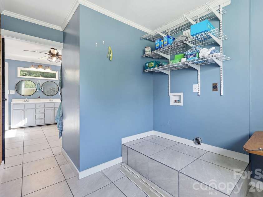 5054 Sugar Hill Road, Marion, NC 28752.  MLS# CAR4359799, YatesRealty ID 19956. Laundry/Storage Room
