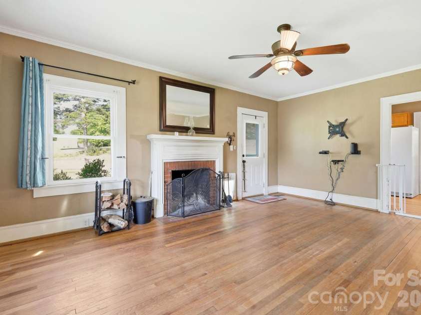 5054 Sugar Hill Road, Marion, NC 28752.  MLS# CAR4359799, YatesRealty ID 19956. Living Room