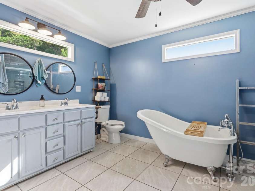 5054 Sugar Hill Road, Marion, NC 28752.  MLS# CAR4359799, YatesRealty ID 19956. Primary Bathroom