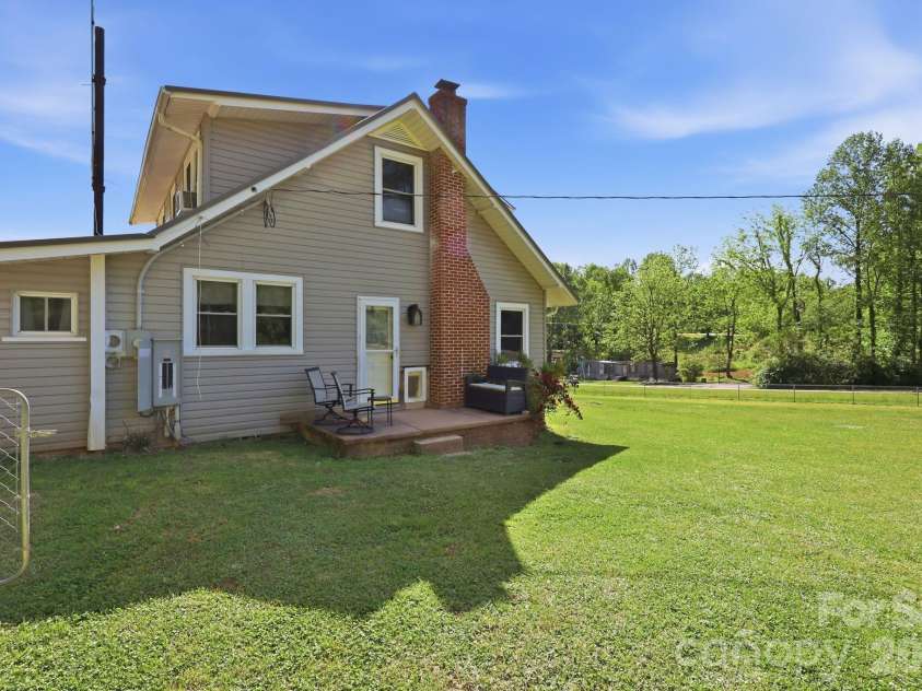 5054 Sugar Hill Road, Marion, NC 28752.  MLS# CAR4359799, YatesRealty ID 19956. Side Yard