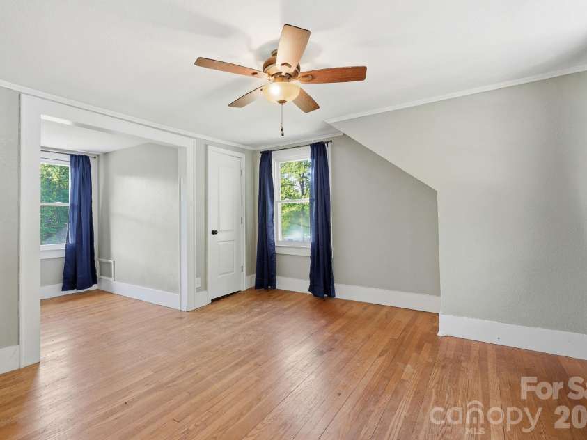 5054 Sugar Hill Road, Marion, NC 28752.  MLS# CAR4359799, YatesRealty ID 19956. Upstairs Bedroom