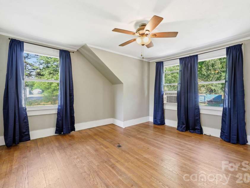 5054 Sugar Hill Road, Marion, NC 28752.  MLS# CAR4359799, YatesRealty ID 19956. Upstairs Bedroom