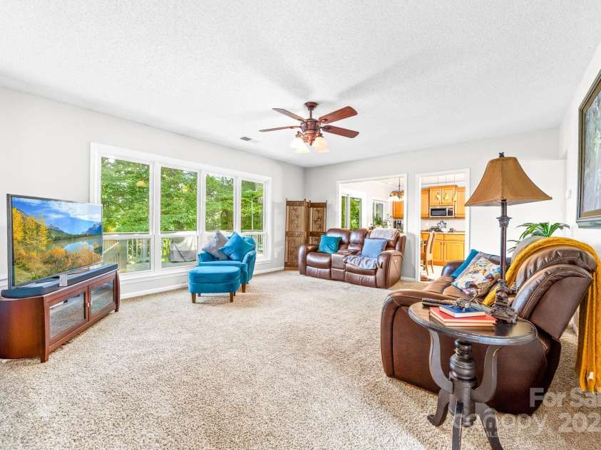 12712 Hollyhock Lane, Huntersville, NC 28078.  MLS# CAR4267293, YatesRealty ID 19958. Large windows overlooking the vast deck