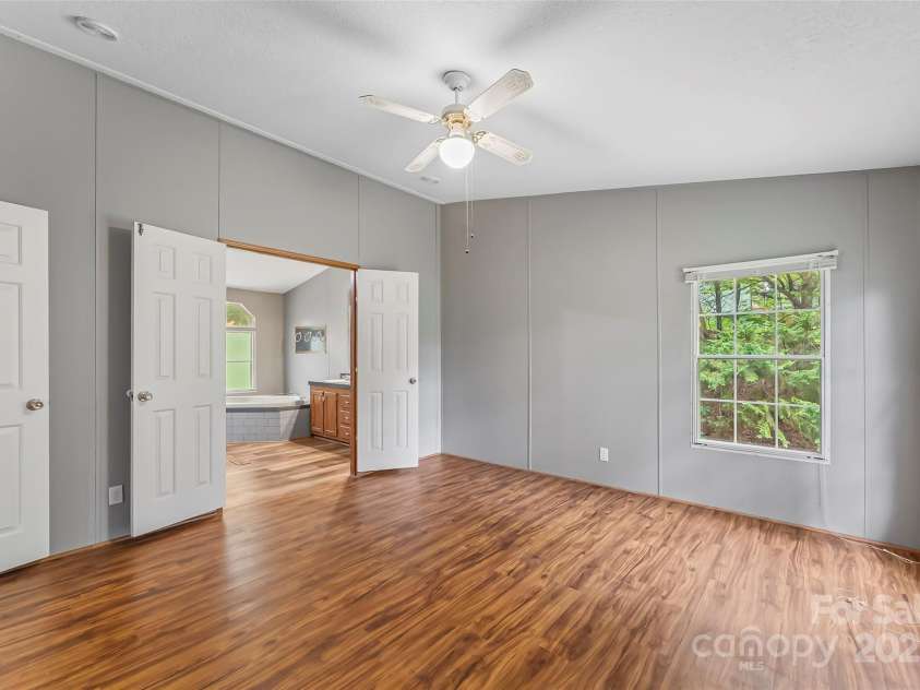 89 Brookwood Drive, Marion, NC 28752.  MLS# CAR4300561, YatesRealty ID 1996. Primary BR Suite