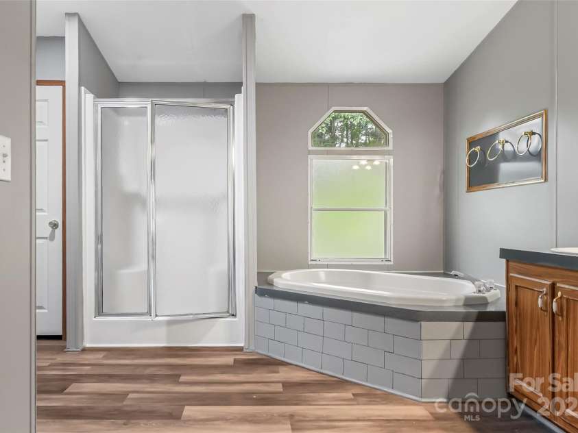 89 Brookwood Drive, Marion, NC 28752.  MLS# CAR4300561, YatesRealty ID 1996. Primary BR Suite