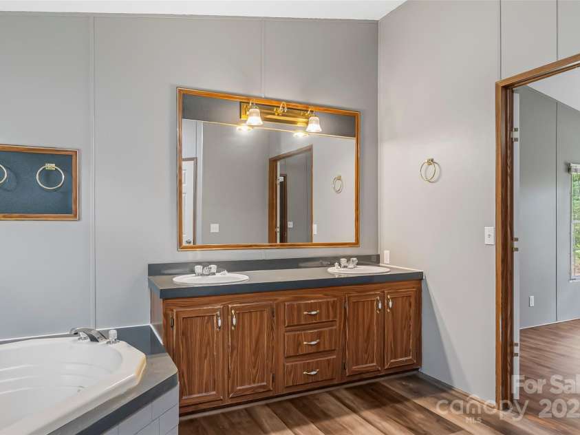 89 Brookwood Drive, Marion, NC 28752.  MLS# CAR4300561, YatesRealty ID 1996. Primary BR Suite