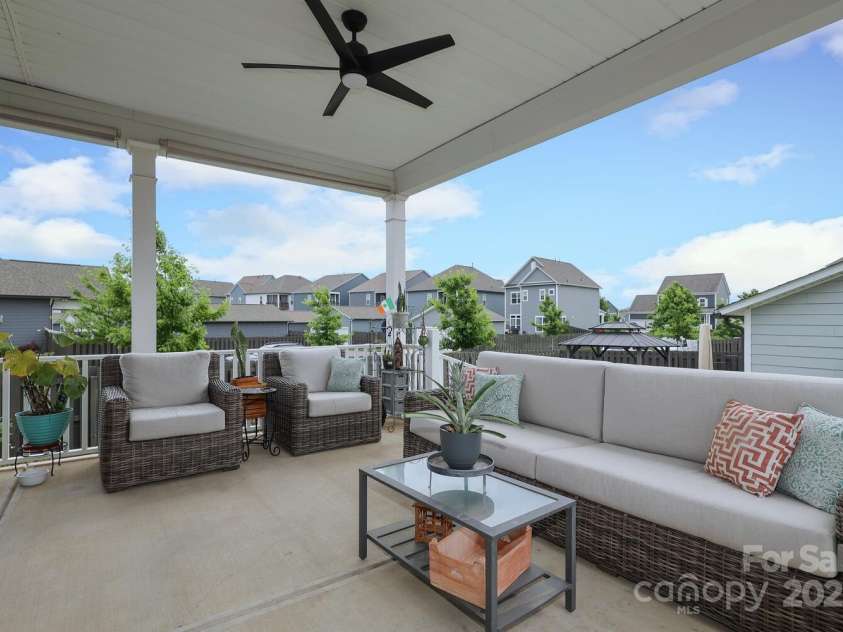 13624 Jacks Lane, Pineville, NC 28134.  MLS# CAR4251178, YatesRealty ID 19960. Gracious Covered Back Porch directly off the kitchen